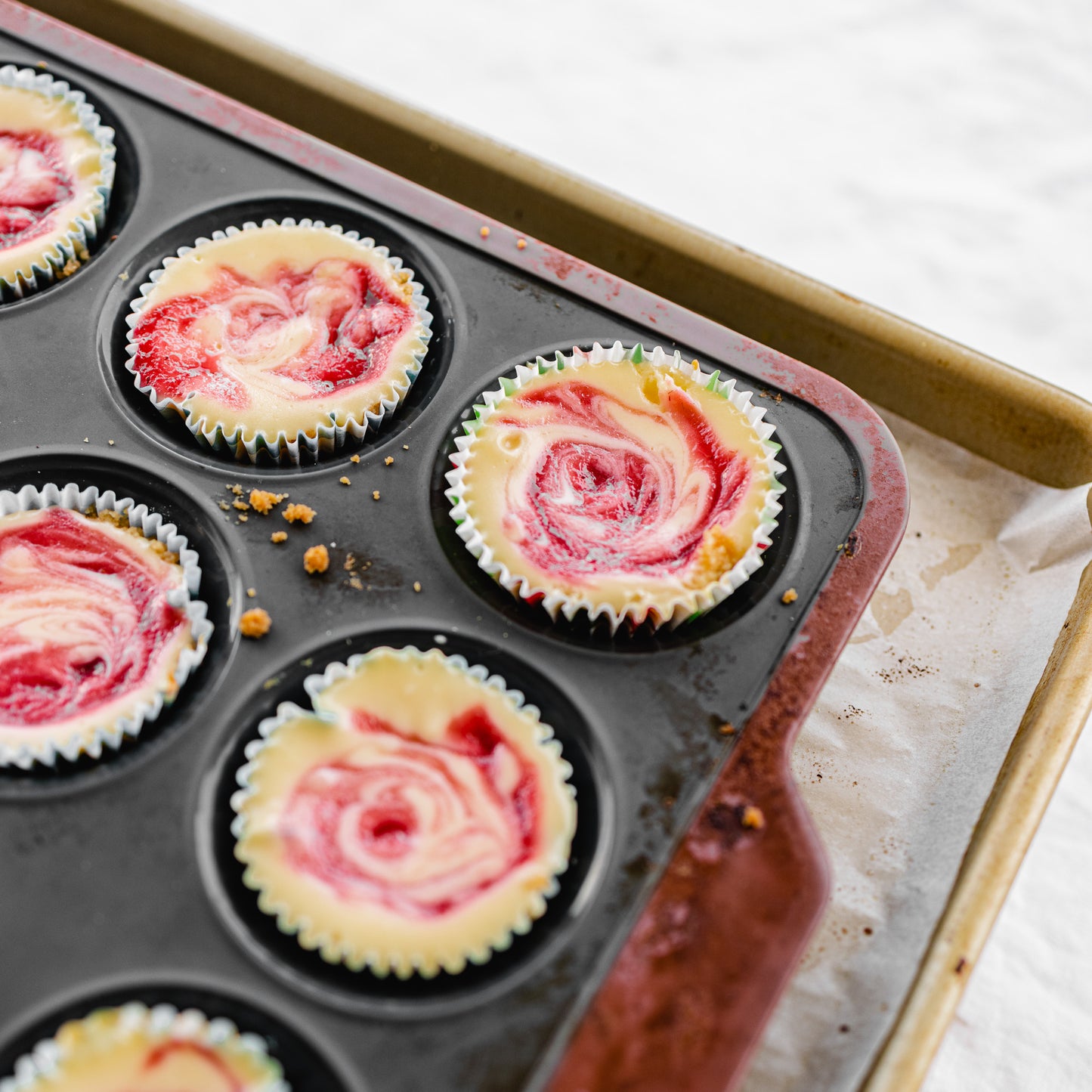 Raspberry Swirl Cheesecake Cupcakes